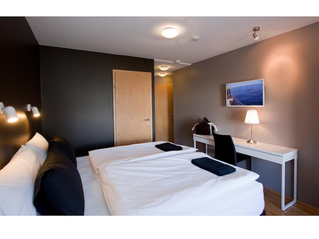 אקורירי Torg Guest House חדר תמונה